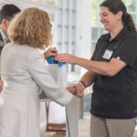 faculty collecting her bag